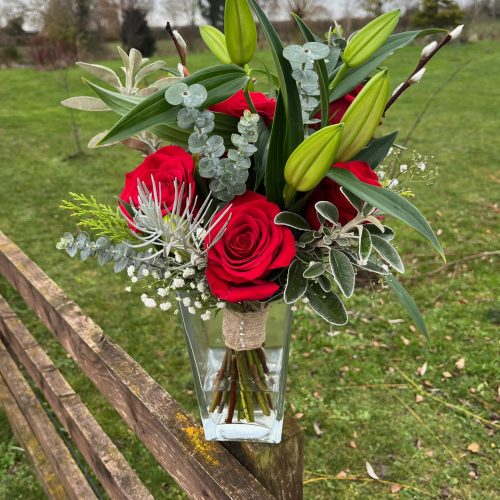 Brides bouquet with Hessian Hold and red roses DEC23